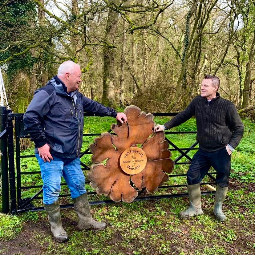 Founder of Irish Memorial Trees Bob Hamilton and John Doran standing with the Irish Trees sign